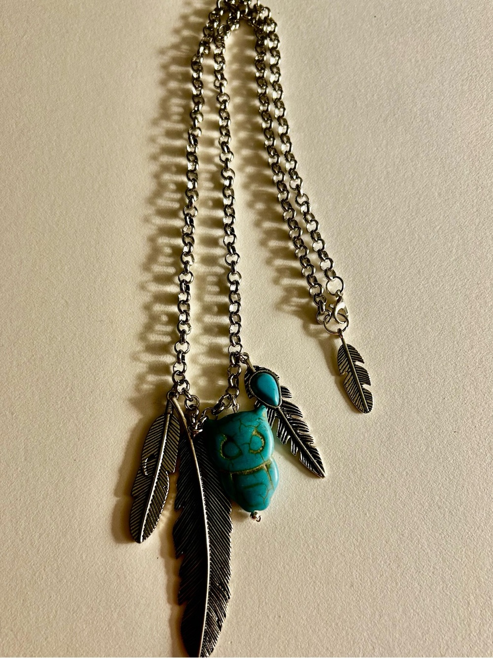 NWOT Charms Necklace: Turquoise Howlite Owl & silver Feather pendants, Rolo link